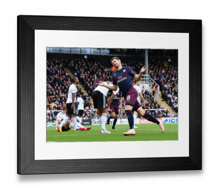 Framed Print : Arsenal's Aaron Ramsey Scores Hat-Trick: Crushing Fulham in Premier League Showdown