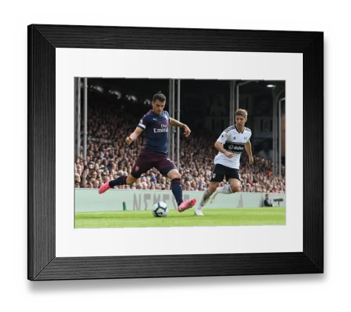 Framed Print : Xhaka vs Vietto: Battle at Craven Cottage - Fulham vs Arsenal, Premier League 2018-19