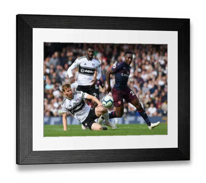 Framed Print : Danny Welbeck Breaks Past Fulham Defenders Anguissa and Ream in Premier League Clash