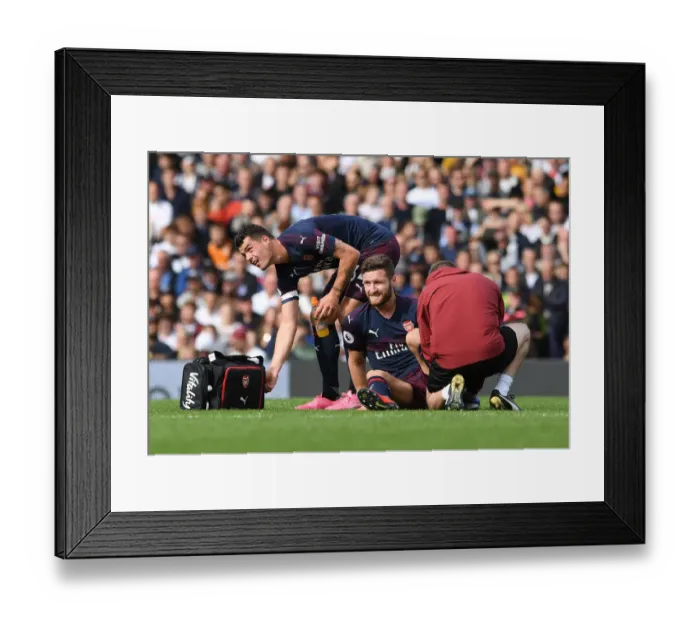 Framed Print : Arsenal's Mustafi and Xhaka: A Moment of Relief Amidst the Intensity of Fulham vs. Arsenal (2018-19) Framed Print : Arsenal's Mustafi and Xhaka: A Moment of Relief Amidst the Intensity of Fulham vs. Arsenal (2018-19)