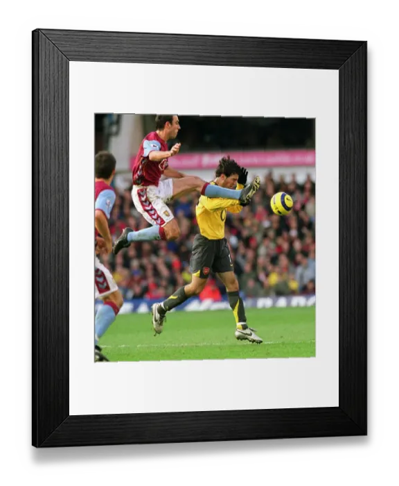 Framed Print : Fabregas vs McCann: A Battle of Midfield Maestros at Villa Park, 2005