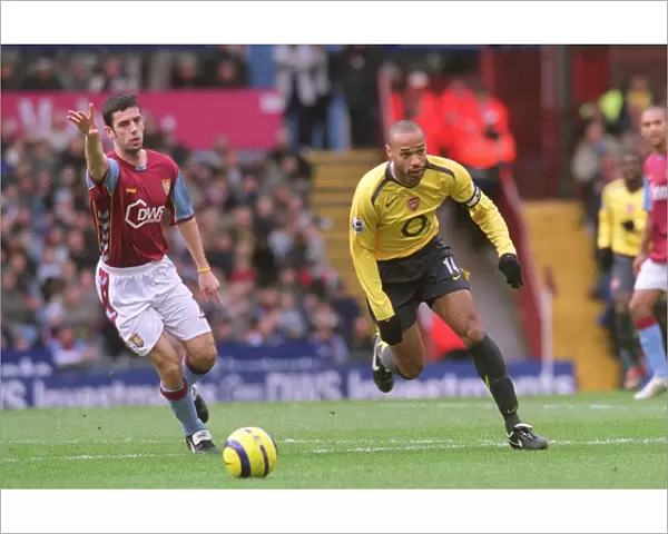 Thierry Henry (Arsenal) Mark Delaney (Aston Villa). Aston Villa 0: 0 Arsenal
