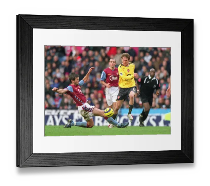 Framed Print : Alex Hleb (Arsenal) Eirik Bakke (Aston Villa). Aston Villa 0: 0 Arsenal Framed Print : Alex Hleb (Arsenal) Eirik Bakke (Aston Villa). Aston Villa 0: 0 Arsenal