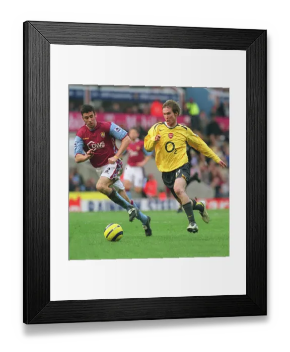 Framed Print : Alex Hleb (Arsenal) Mark Delaney (Aston Villa). Aston Villa 0: 0 Arsenal