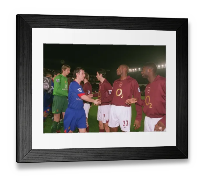 Framed Print : Sol Campbell and Kolo Toure (Arsenal) shake hands with Gary Neville (Man Utd) Framed Print : Sol Campbell and Kolo Toure (Arsenal) shake hands with Gary Neville (Man Utd)