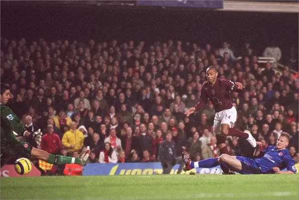 Thierry Henry scores his 3rd goal Arsenals 6th under pressure from David Wheater