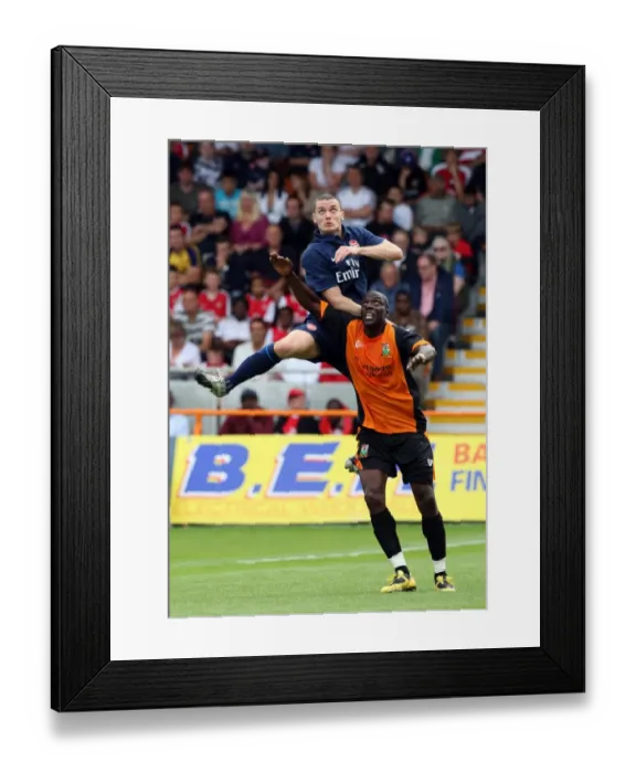 Framed Print : Thomas Vermaelen (Arsenal) Paul Furlong (Barnet) Framed Print : Thomas Vermaelen (Arsenal) Paul Furlong (Barnet)