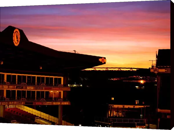 The Sun sets over The Arsenal and Emirates stadiums