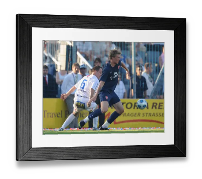 Framed Print : Nicklas Bendtner (Arsenal) Patrick Lehner (SC Columbia) Framed Print : Nicklas Bendtner (Arsenal) Patrick Lehner (SC Columbia)
