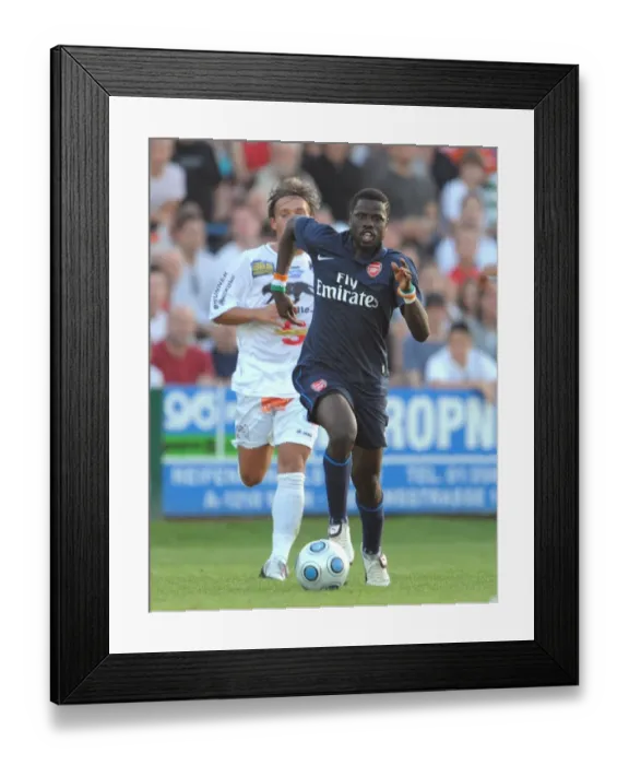 Framed Print : Emmanuel Eboue (Arsenal) Chrisian Schweigler (SC Columbia)
