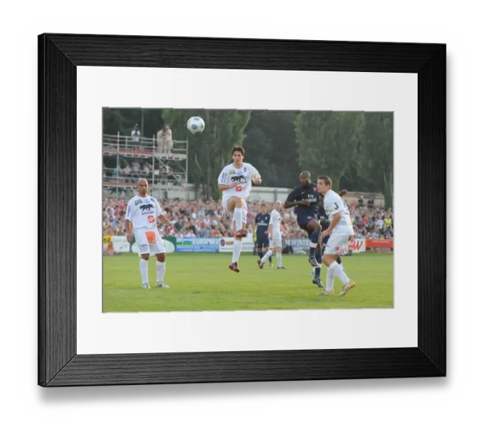 Framed Print : William Gallas heads past SC Columbia goalkeeper Gerhard Framed Print : William Gallas heads past SC Columbia goalkeeper Gerhard