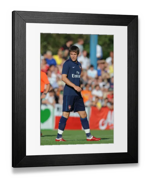 Framed Print : Arsenal's Aaron Ramsey Shines in 7-1 Pre-Season Victory over SC Columbia, Vienna 2009