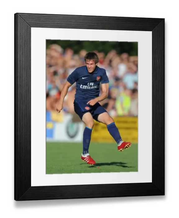 Framed Print : Arsenal's Aaron Ramsey Shines: 7-1 Crush of SC Columbia in 2009 Pre-Season Friendly Framed Print : Arsenal's Aaron Ramsey Shines: 7-1 Crush of SC Columbia in 2009 Pre-Season Friendly