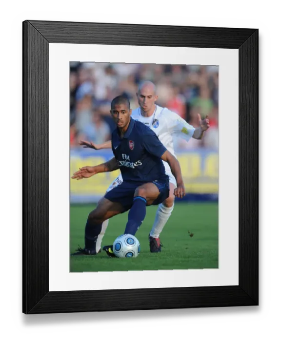 Framed Print : Armand Traore vs Markus Buchinger: Arsenal's Dominance over SC Columbia in 2009 Pre-Season Friendly (1:7 Score) Framed Print : Armand Traore vs Markus Buchinger: Arsenal's Dominance over SC Columbia in 2009 Pre-Season Friendly (1:7 Score)