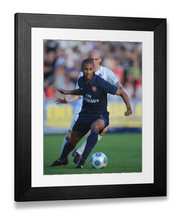 Framed Print : Armand Traore (Arsenal) Markus Buchinger (SC Columbia) Framed Print : Armand Traore (Arsenal) Markus Buchinger (SC Columbia)