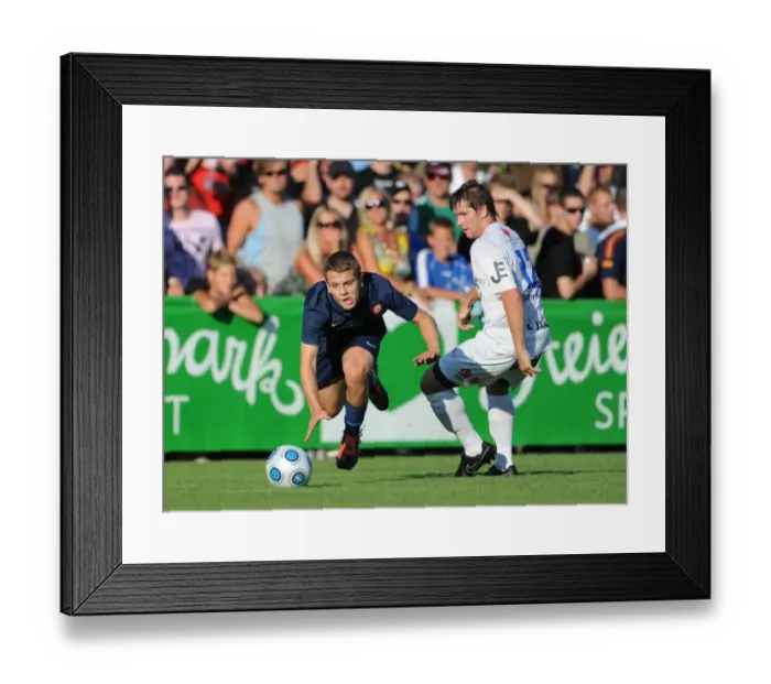 Framed Print : Jack Wilshere vs. Alexander Frimmel: Arsenal's Dominance Over SC Columbia in 2009 Pre-Season Friendly