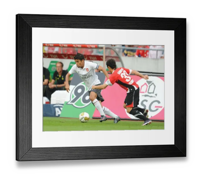 Framed Print : Arsenal FC Prints Previous Season Matches: Matches 2009-10: Hannover 96 v Arsenal 2009-10