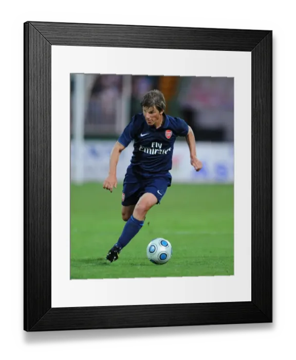 Framed Print : Arsenal's Ardrey Arshavin Shines in 5-0 Pre-Season Victory over Szombathelyi Framed Print : Arsenal's Ardrey Arshavin Shines in 5-0 Pre-Season Victory over Szombathelyi