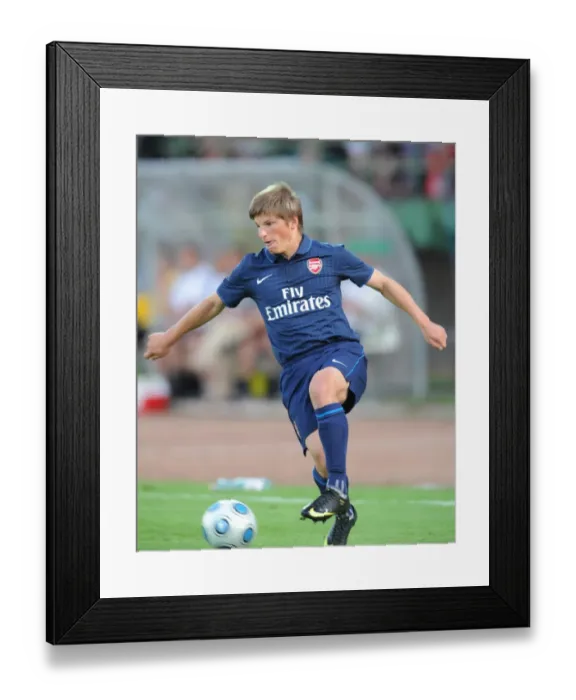 Framed Print : Ardrey Arshavin's Dominant Performance: Arsenal Crushes Szombathelyi 5-0 in Pre-Season Friendly, July 2009