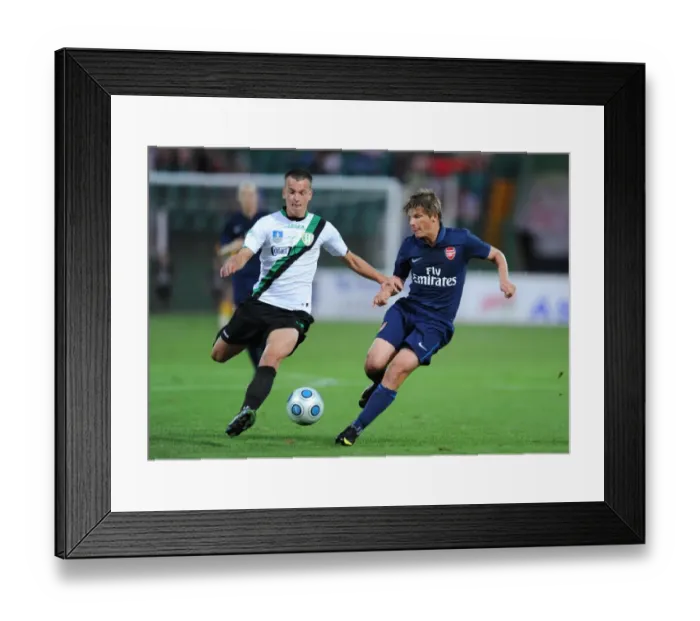 Framed Print : Andrey Arshavin (Arsenal) Fereng Racz (Szombathelyi) Framed Print : Andrey Arshavin (Arsenal) Fereng Racz (Szombathelyi)