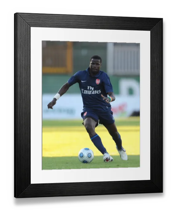 Framed Print : Emmanuel Eboue in Action: Arsenal's Dominant 5-0 Pre-Season Win Over Szombathelyi (July 2009) Framed Print : Emmanuel Eboue in Action: Arsenal's Dominant 5-0 Pre-Season Win Over Szombathelyi (July 2009)