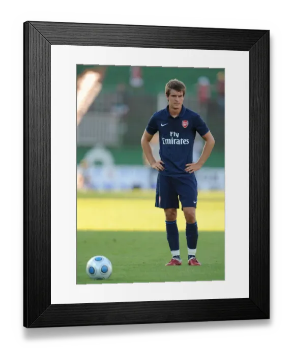 Framed Print : Arsenal's Aaron Ramsey Shines in Dominant 5-0 Pre-Season Debut Against Szombathelyi, Hungary, 2009 Framed Print : Arsenal's Aaron Ramsey Shines in Dominant 5-0 Pre-Season Debut Against Szombathelyi, Hungary, 2009