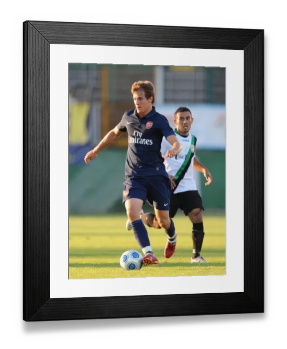 Framed Print : Aaron Ramsey's Brilliant Performance: Arsenal Crushes Szombathelyi 5-0 in Pre-Season Friendly, 2009