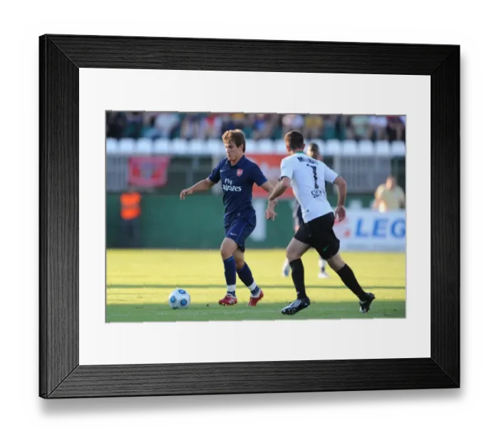 Framed Print : Aaron Ramsey (Arsenal) Balazs Molnar (Szombathelyi)