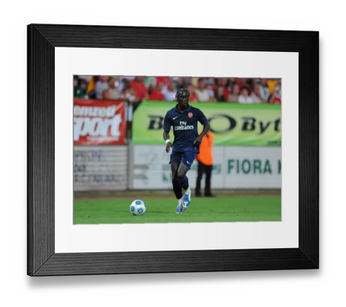 Framed Print : Bacary Sagna in Action: Arsenal's Dominance over Szombathelyi (5-0)