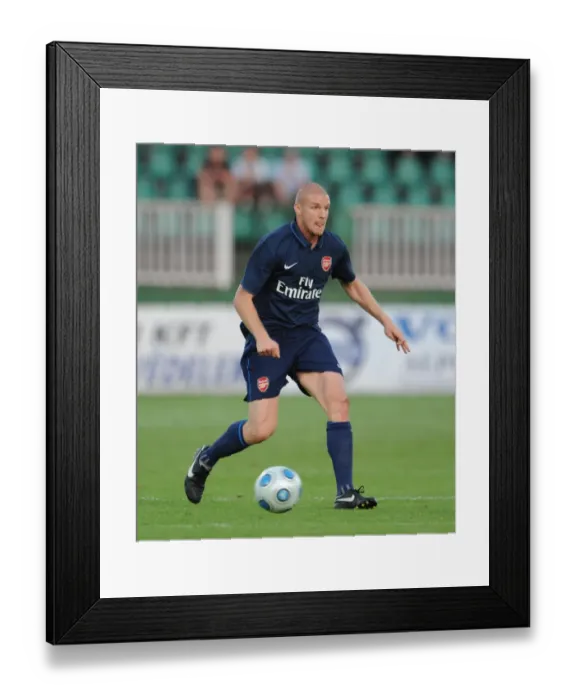 Framed Print : Philippe Senderos in Action: Arsenal's Dominant Pre-Season Win Against Szombathelyi (July 2009)