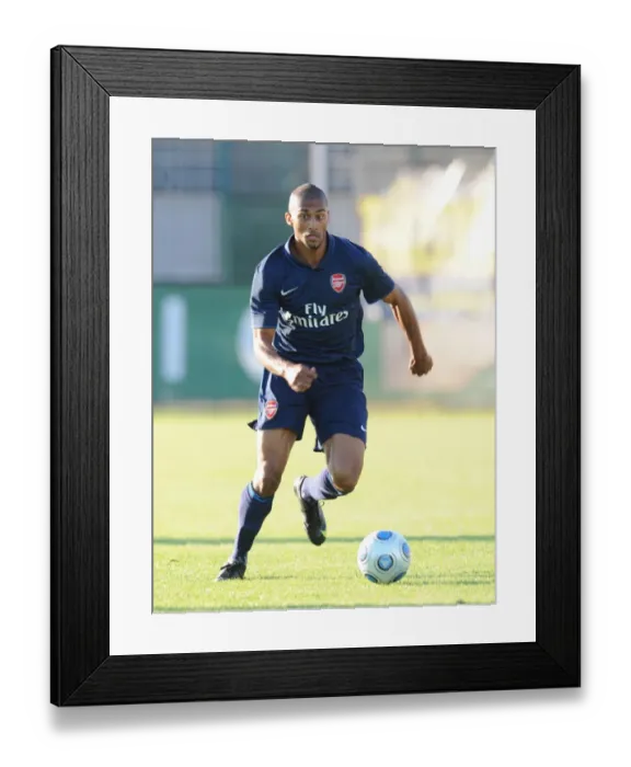 Framed Print : Armand Traore in Action: Arsenal Crushes Szombathelyi 5-0 in Pre-Season Friendly, 2009