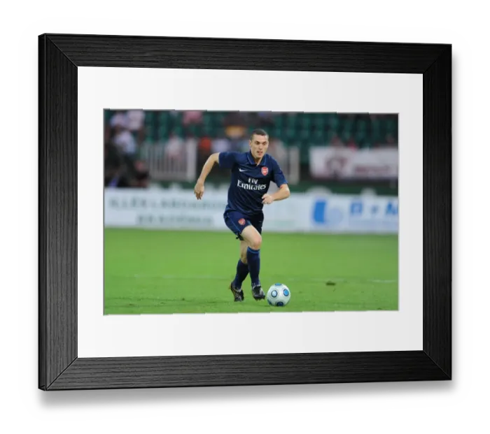 Framed Print : Thomas Vermaelen's Unforgettable Debut: Arsenal's 5-0 Crushing of Szombathelyi in Pre-Season Friendly, July 2009 Framed Print : Thomas Vermaelen's Unforgettable Debut: Arsenal's 5-0 Crushing of Szombathelyi in Pre-Season Friendly, July 2009