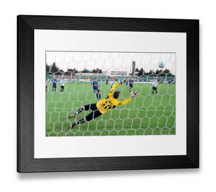 Framed Print : Robin van Persie shoots past Szombathelyi goalkeeoer