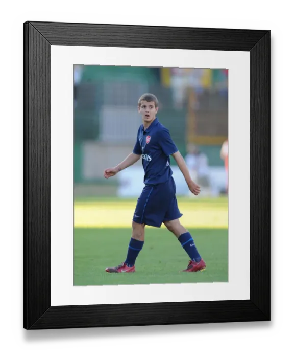 Framed Print : Arsenal's Jack Wilshere Shines in Dominant 5-0 Pre-Season Victory over Szombathelyi (2009)