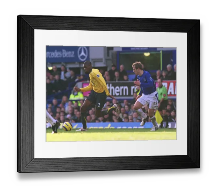 Framed Print : Abou Diaby (Arsenal) Phil Neville (Everton)