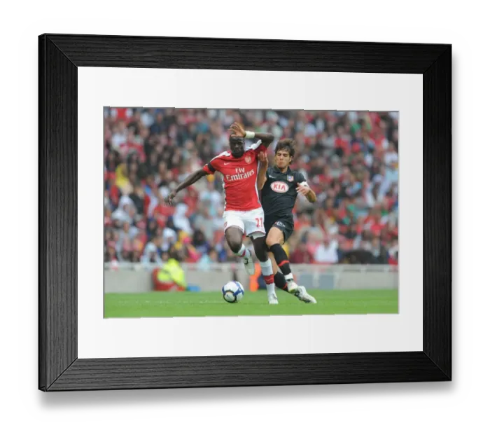 Framed Print : Emmanuel Eboue (Arsenal) Alvaro Dominguez (Athletico Madrid) Framed Print : Emmanuel Eboue (Arsenal) Alvaro Dominguez (Athletico Madrid)