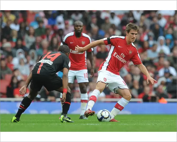 Aaron Ramsey (Arsenal) Florent Sinama-Pongolle (Athletico Madrid)