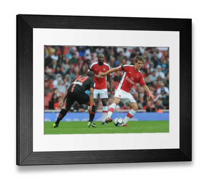 Framed Print : Aaron Ramsey (Arsenal) Florent Sinama-Pongolle (Athletico Madrid)