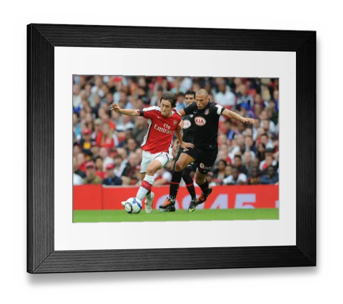 Framed Print : Arsenal's Rosicky and Heitinga Clash in Intense 2009 Emirates Cup Match: Arsenal 2:1 Athletico Madrid