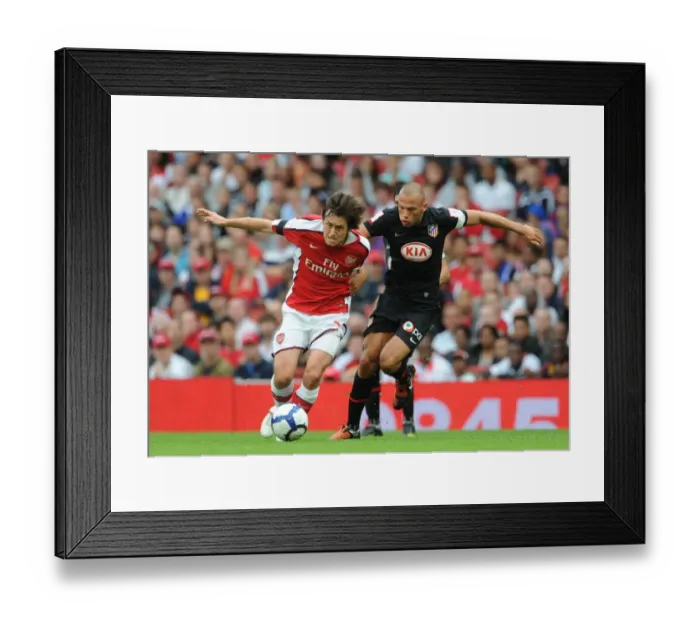 Framed Print : Tomas Rosicky (Arsenal) John Heitinga (Athletico Madrid)