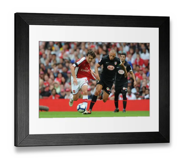 Framed Print : Intense Clash: Rosicky vs. Heitinga in Arsenal's 2009 Emirates Cup Match Against Athletico Madrid (2:1) Framed Print : Intense Clash: Rosicky vs. Heitinga in Arsenal's 2009 Emirates Cup Match Against Athletico Madrid (2:1)