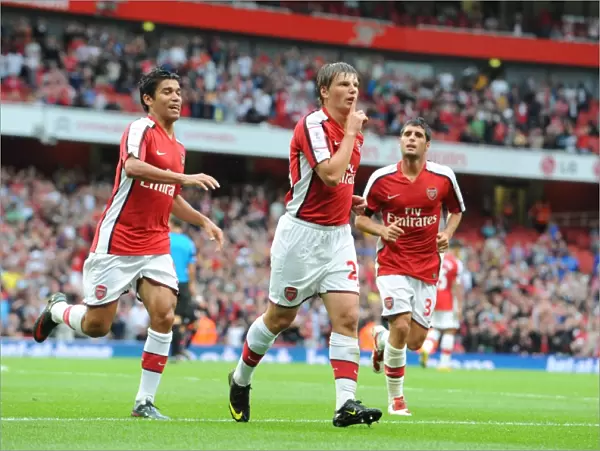 Arsene Wenger's Men: Arshavin, Eduardo, and Merida Celebrate Arsenal's First Goal Against Athletico Madrid, Emirates Cup 2009