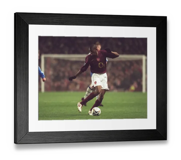 Framed Print : Abou Diaby in Action: Dramatic Carling League Cup Semifinal Clash between Arsenal and Wigan Athletic, Highbury, London, 2005 Framed Print : Abou Diaby in Action: Dramatic Carling League Cup Semifinal Clash between Arsenal and Wigan Athletic, Highbury, London, 2005