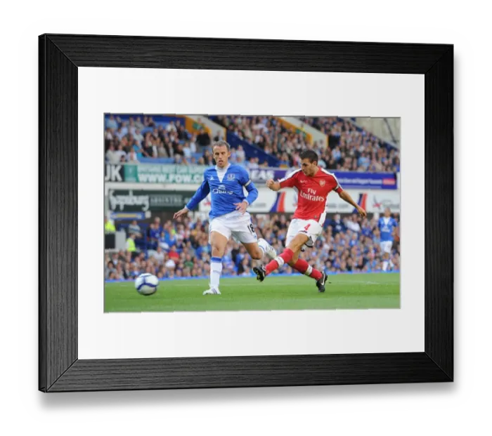 Framed Print : Cesc Fabregas shoots past Phil Neville to score the 4th Arsenal goal