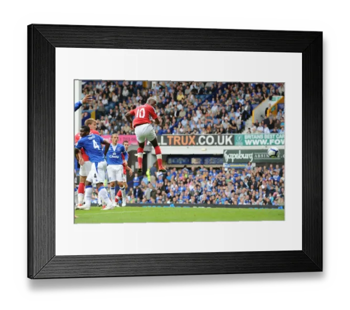 Framed Print : William Gallas heads past Everton goalkeeper Tim Howard