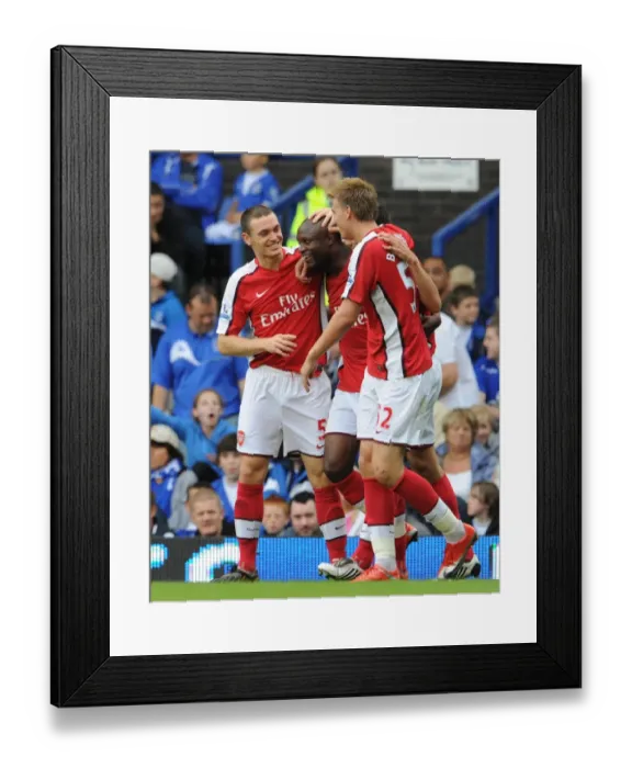 Framed Print : Arsenal's Triumphant Three-Goal Celebration: Gallas, Van Persie, Bendtner, and Vermaelen vs. Everton (15 / 8 / 2009)