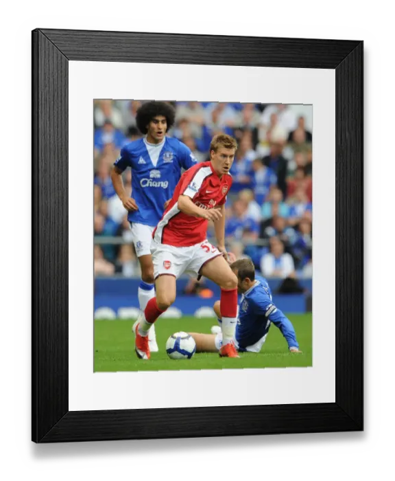 Framed Print : Bendtner's Brilliant Performance: Arsenal's Dominant 1-6 Win over Everton (August 15, 2009)