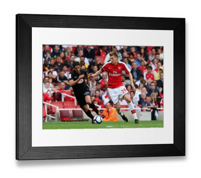 Framed Print : Nicklas Bendtner (Arsenal) Raul Garcia (Atletico)