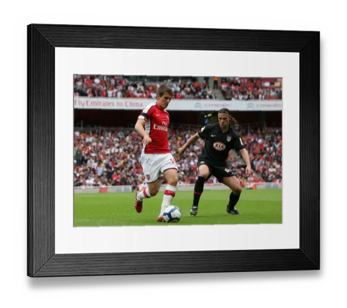 Framed Print : Aaron Ramsey (Arsenal) Tomas Ujfalusi (Atletico) Framed Print : Aaron Ramsey (Arsenal) Tomas Ujfalusi (Atletico)