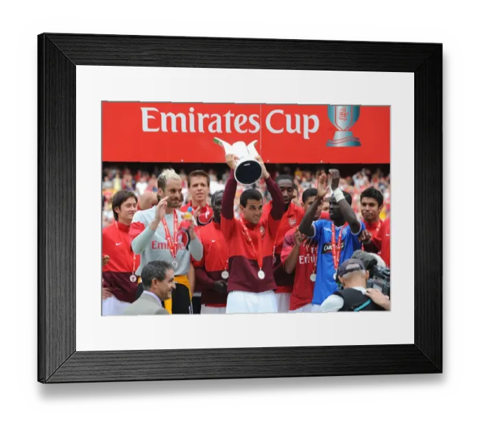 Framed Print : Cesc Fabregas (Arsenal) lifts the Emirates Cup
